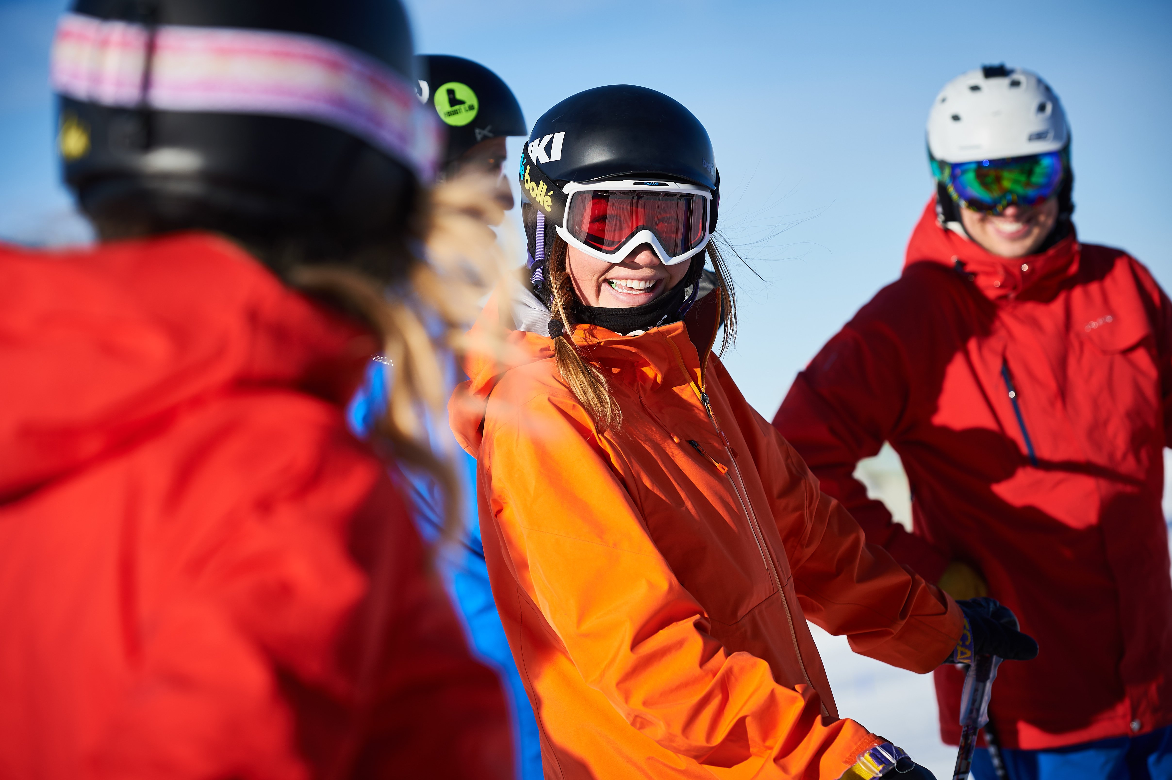 Happy faces in ski and snowboard lessons